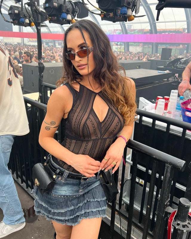Woman posing in bralette at festival from Anaisha collection