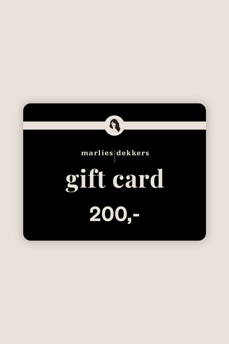 Black gift card with white text on a beige background