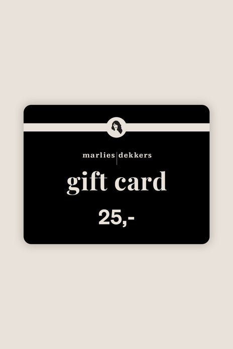 Black gift card with white text on a beige background