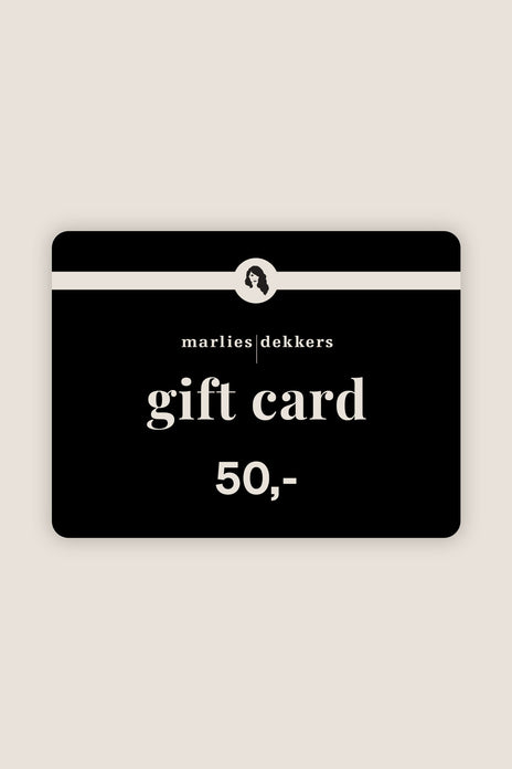 Black gift card with white text on a beige background