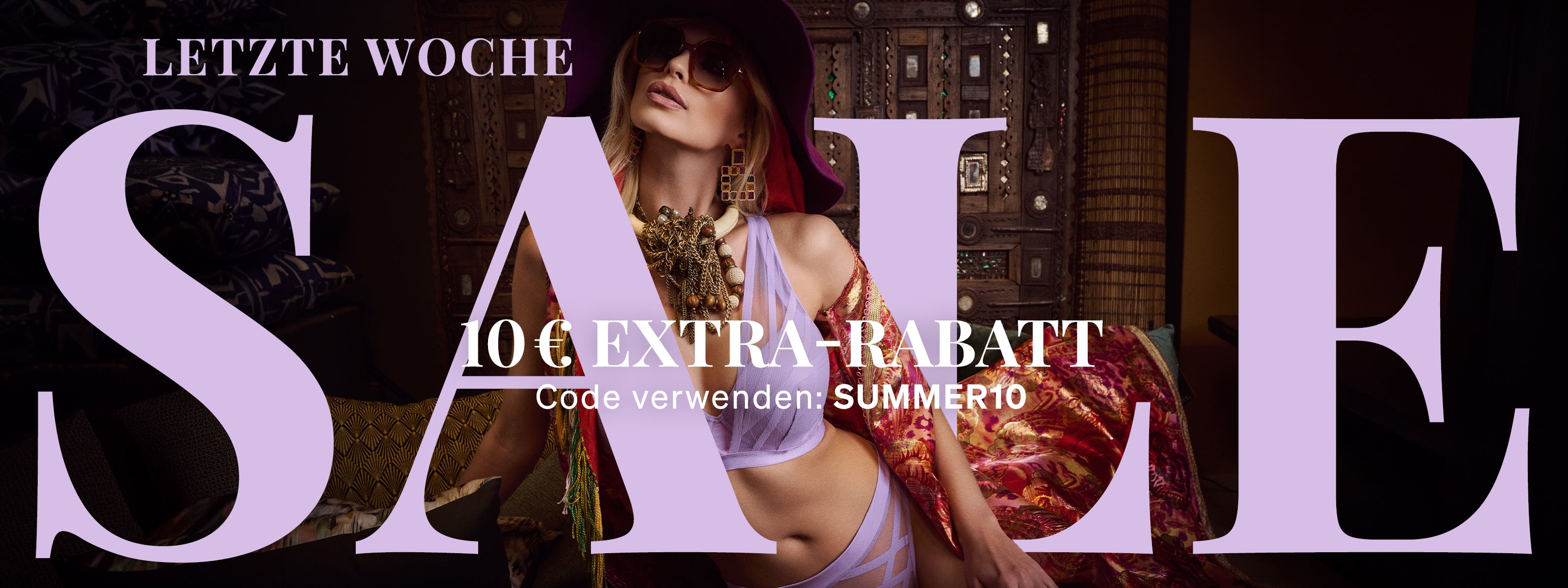 Final week of sale banner with model wearing the Illusionist lilac lush lingerie set 