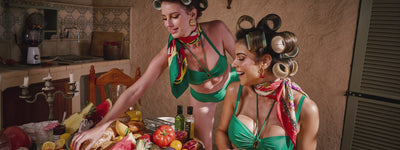 Various models wearing Marlies Dekkers lingerie and swimwear collections, showcasing different designs, colors, and styles