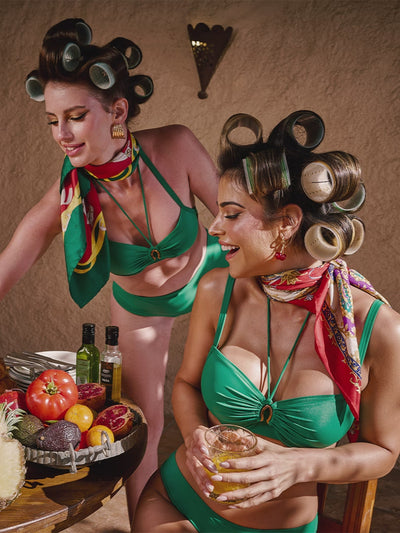 Various models wearing Marlies Dekkers lingerie and swimwear collections, showcasing different designs, colors, and styles