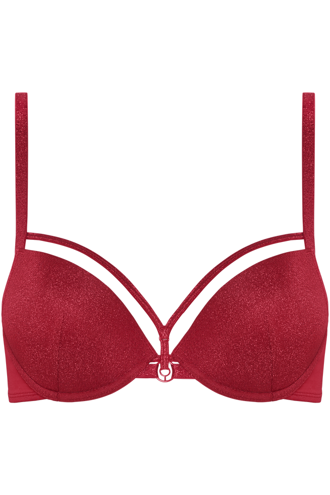 This sparkling red push up bra is a must have in your wardrobe. This soft elastic fabric has been decorated with a shimmering red touch. Decorate your cleavage with glittery finished red straps on top of the cups. As a finishing touch this bra has space ship inspired ornaments on the bindings. Let's not forget the perfect padding that gives you extra support while giving you a dazzlingly deep cleavage. Wear this sparkly bra and dare to be a woman with a mission!